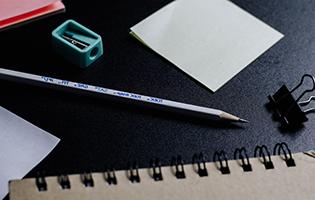 Pencil and Other Supplies on a Table